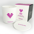 White candle jar with luv heart icon on front and a kindness co text with box and lid with feel all the feels message