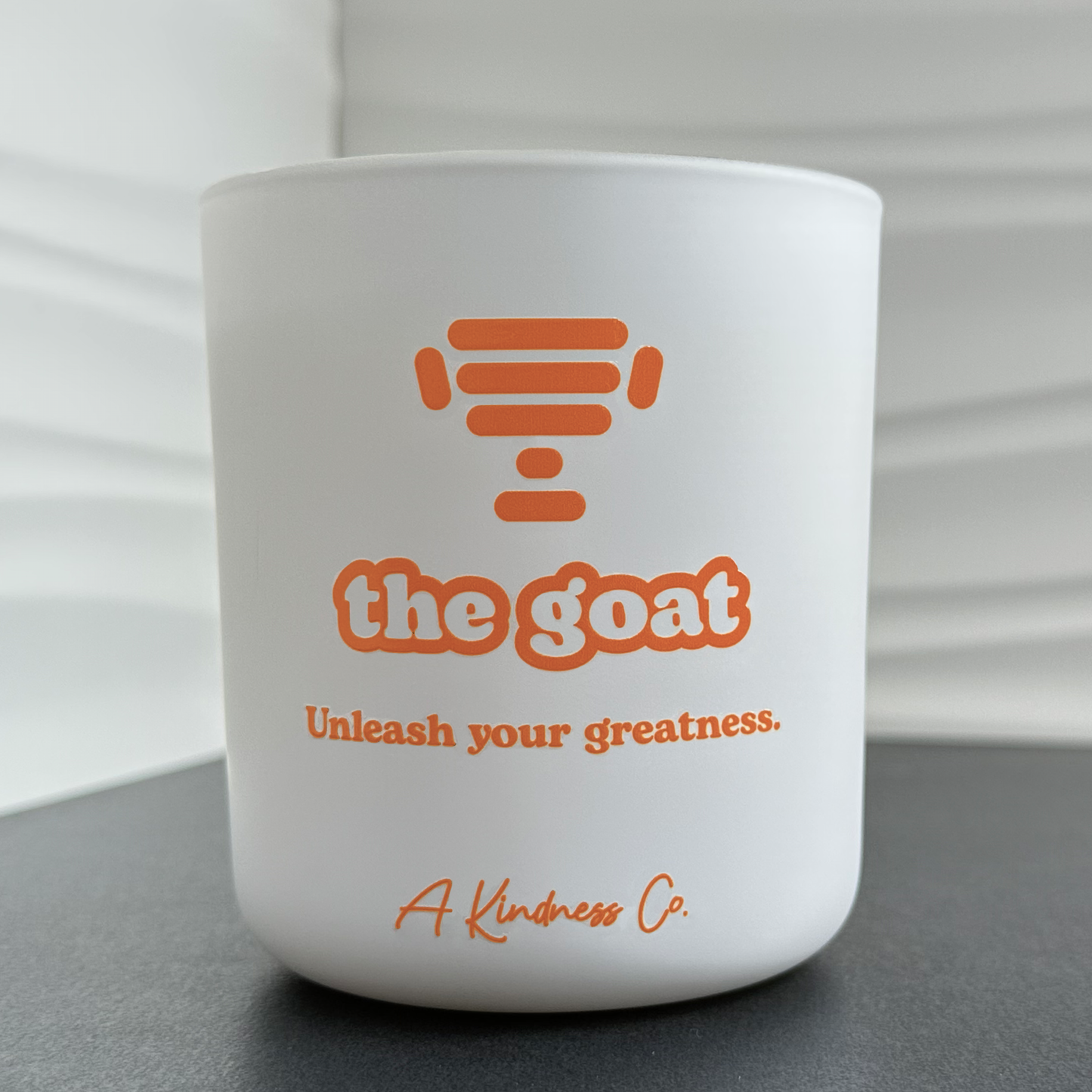 the GOAT 2-wick candle